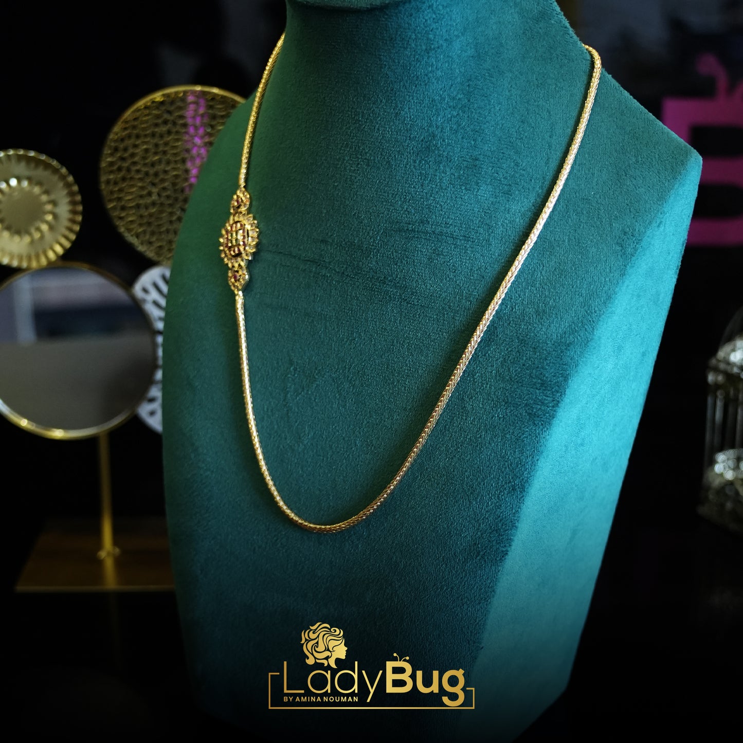 Gold-plated chains with a Ruby Stone and flower broach