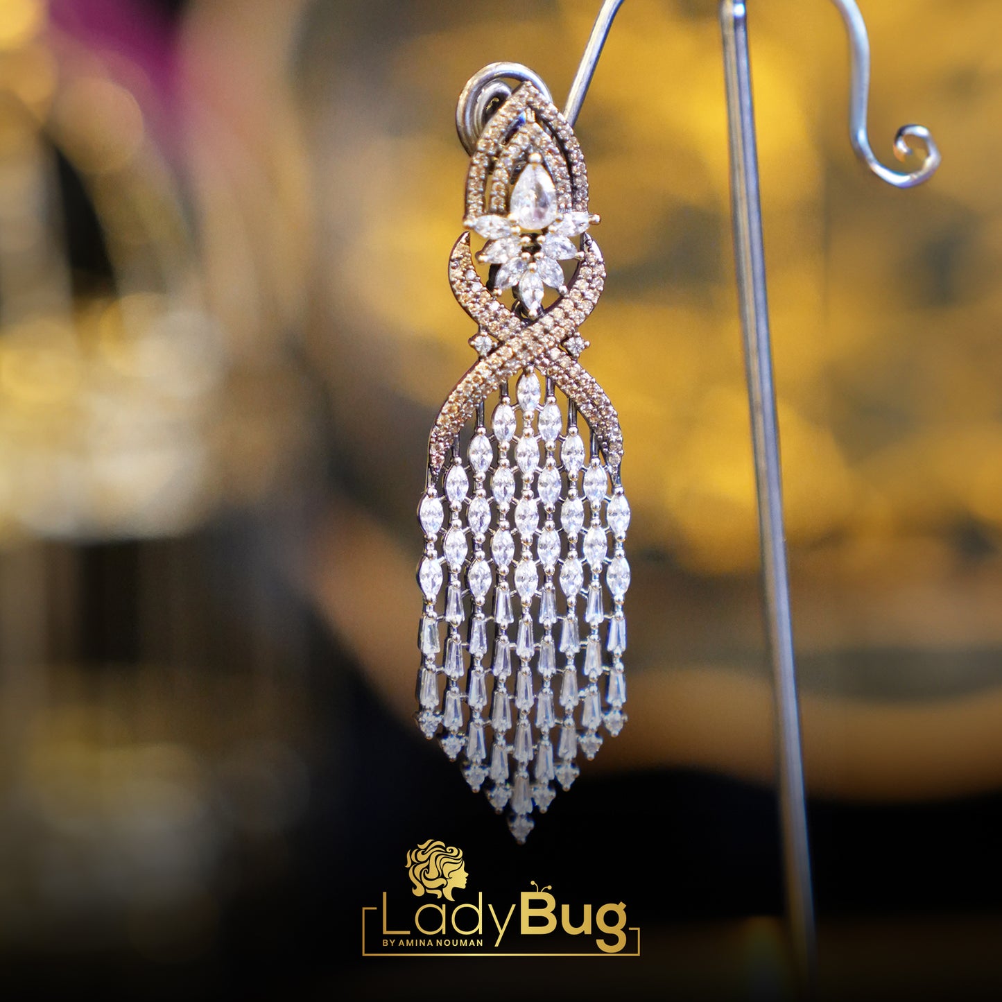 Zircon long earrings in Champagne color