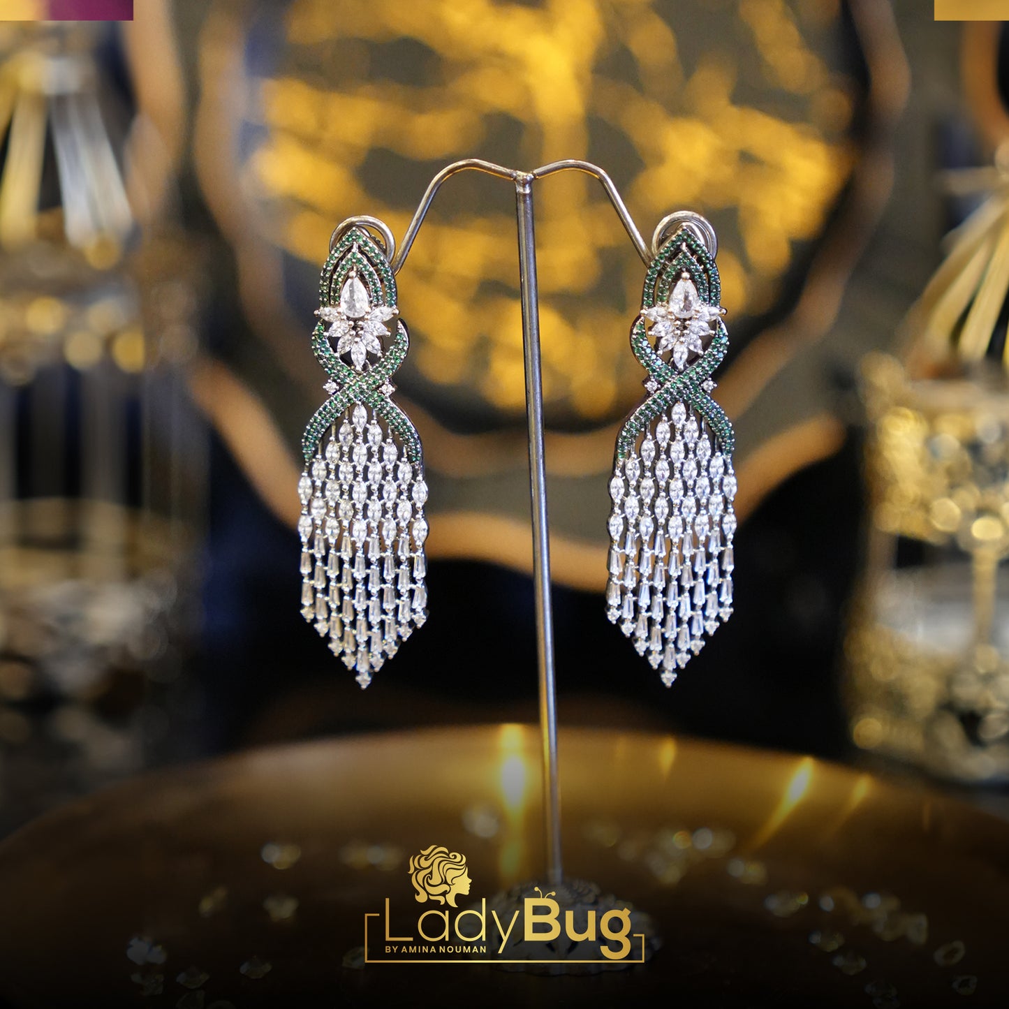 Zircon long earrings in Emerald color