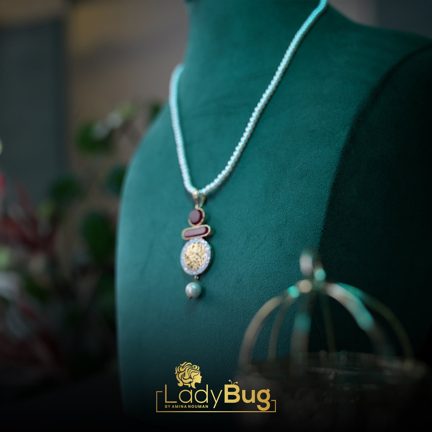 Calligraphy pendent with Ruby Stone