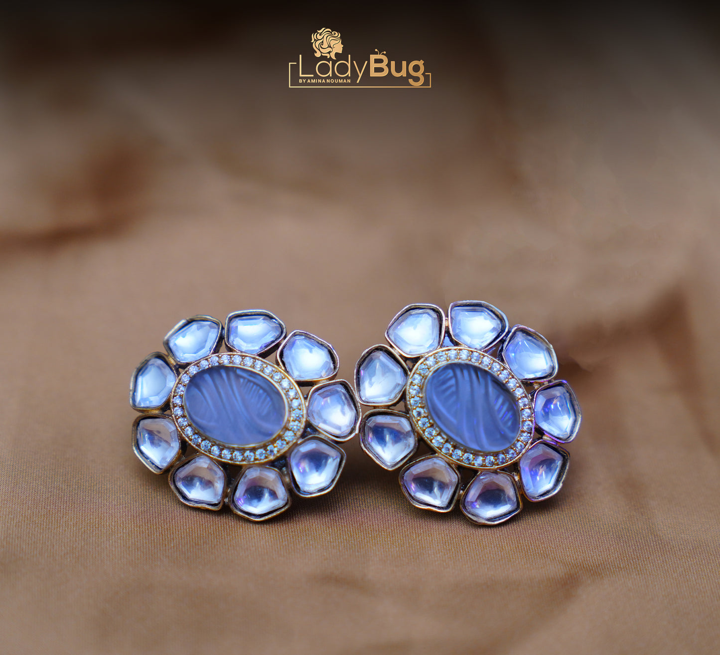 Tyaani Kundan Earrings with Carved Stones