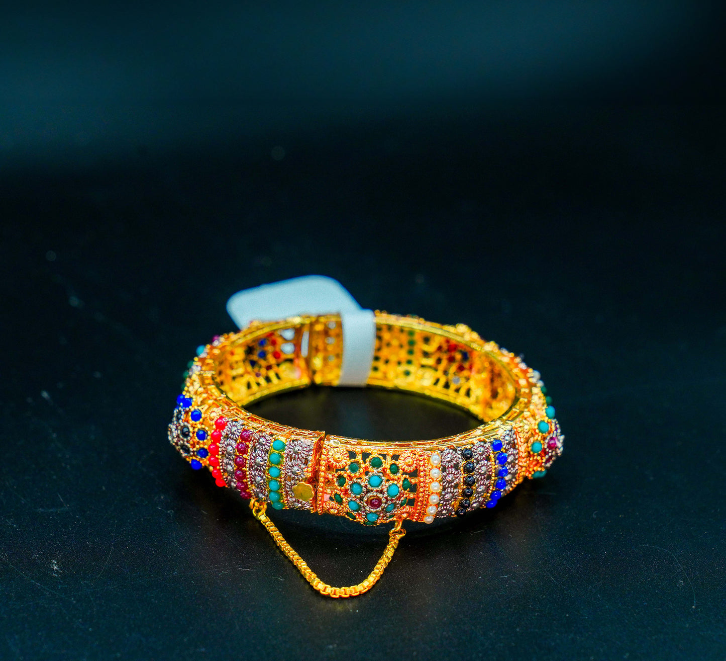 Gold-plated Kara with colorful stones