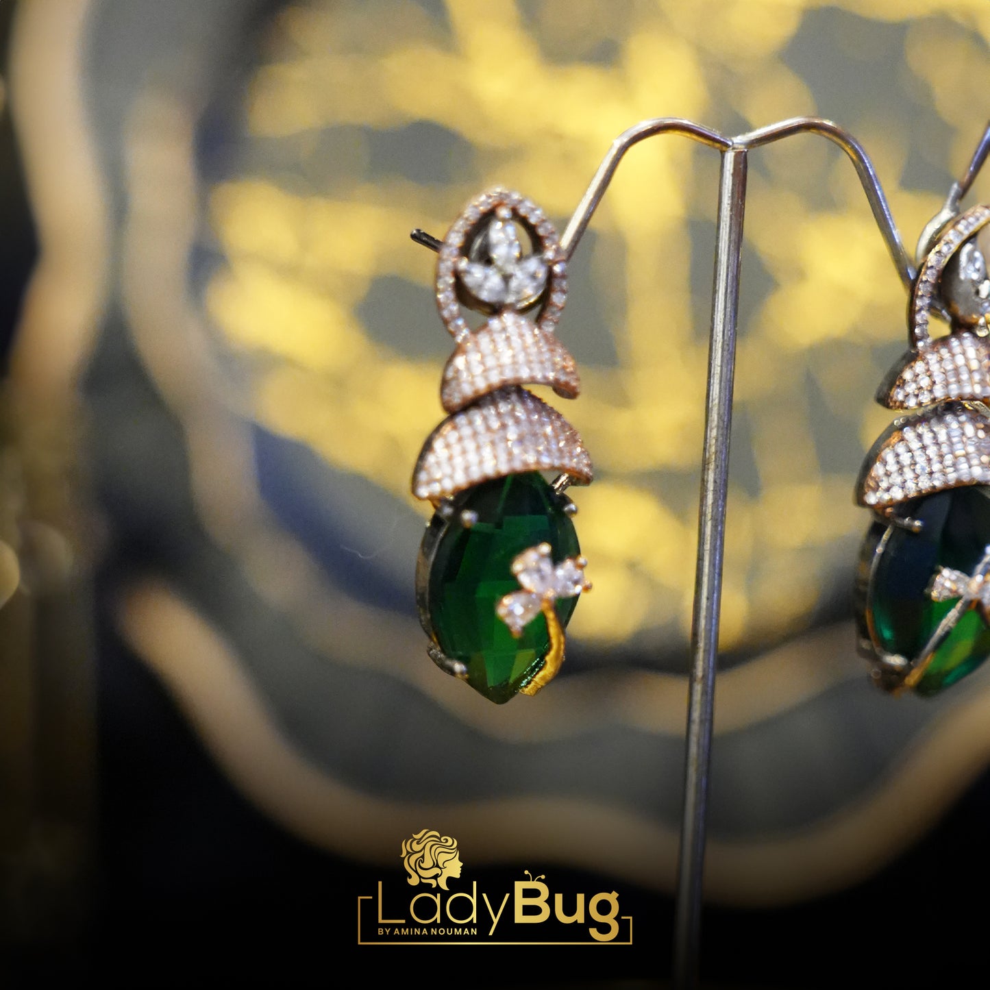 Rhodium-plated Zircon earrings with Emerald Stone