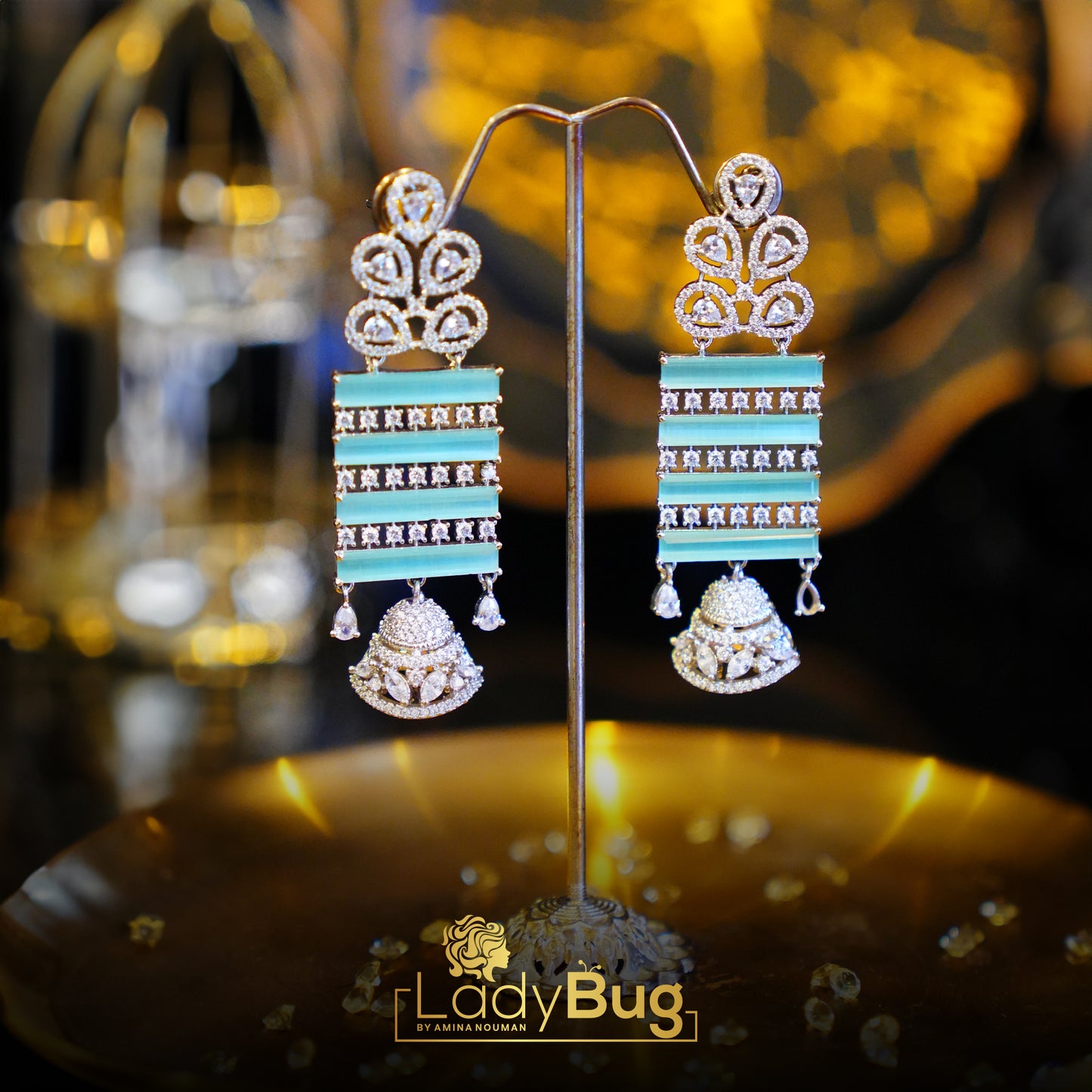 Rhodium-plated earrings with Ad stone and mint color
