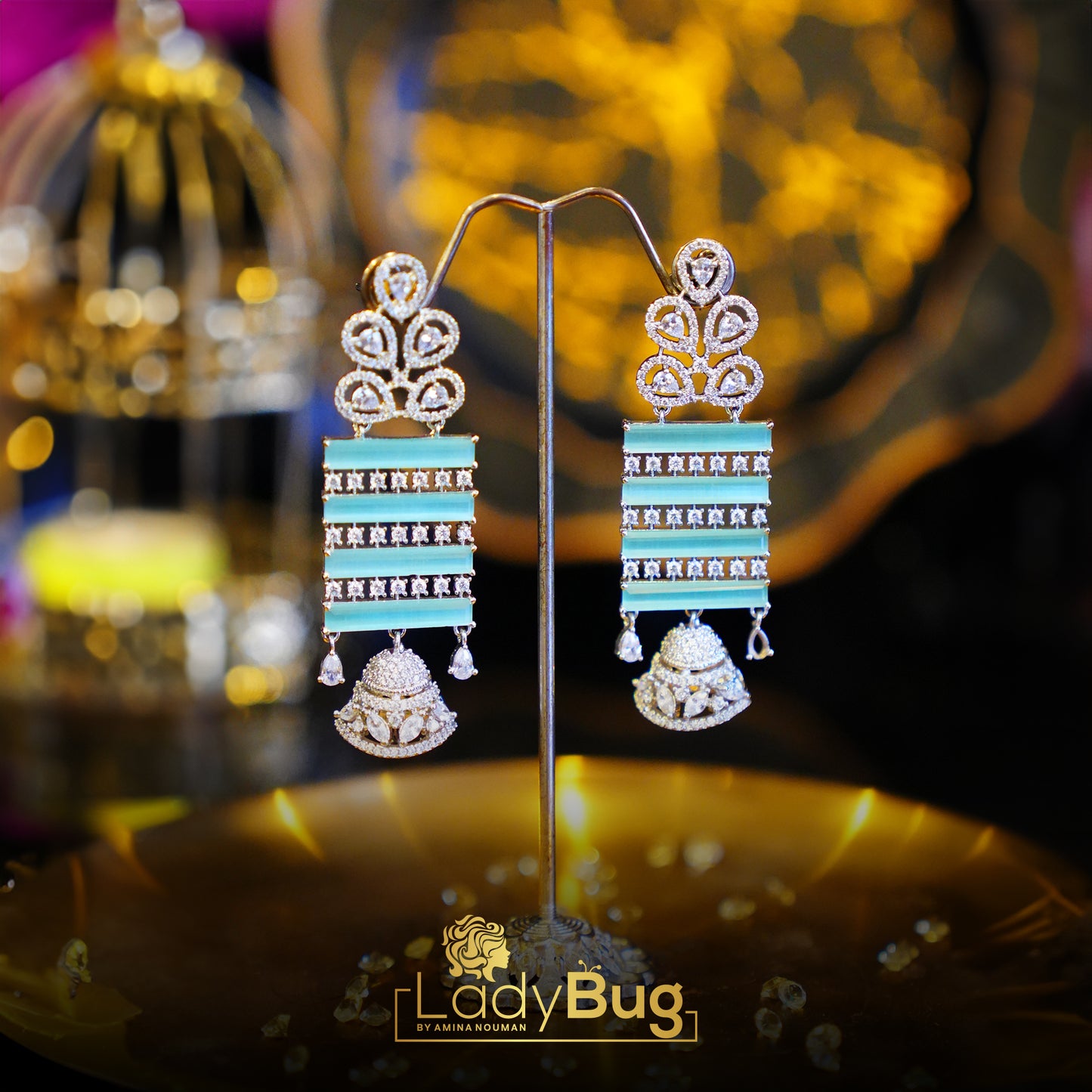 Rhodium-plated earrings with Ad stone and mint color