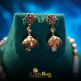 Rajwari set with matte polish and Tiyani Kundan