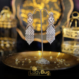 Zircon long earrings in Champagne color