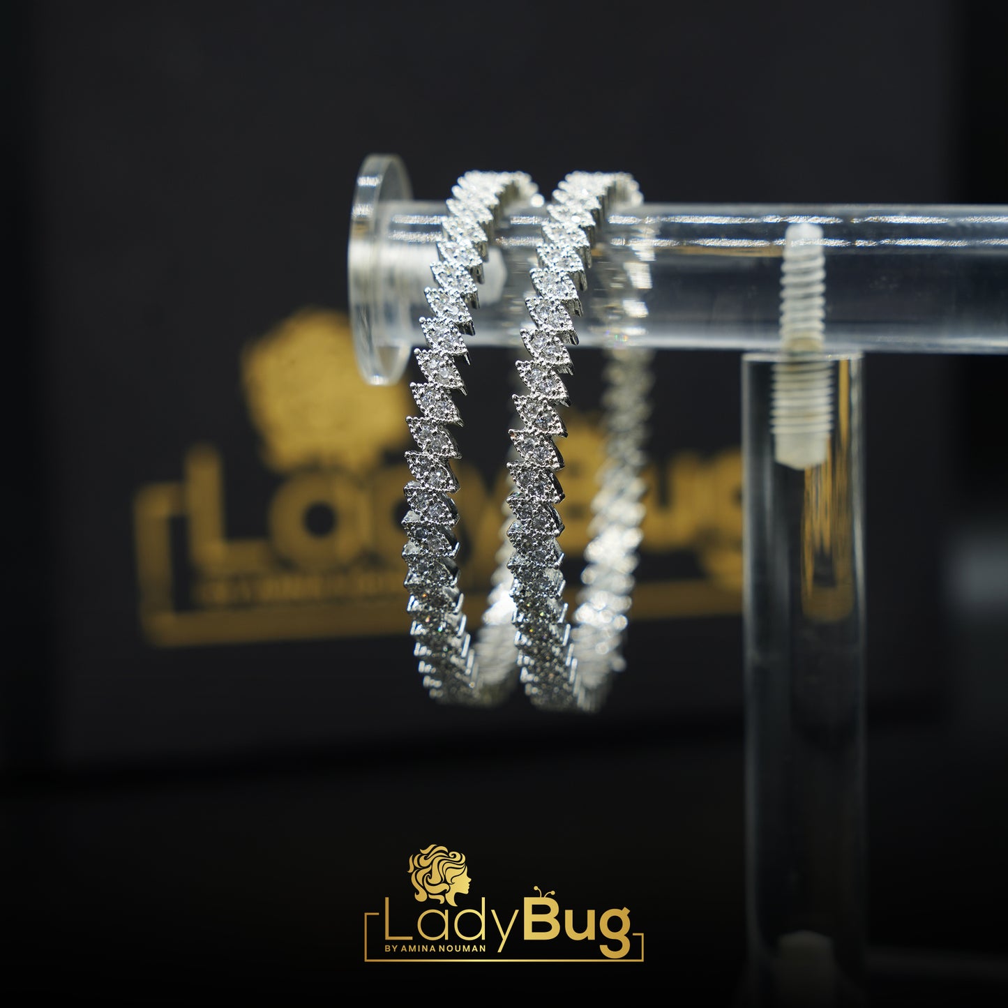 rhodium-plated, diamond-cut bangles
