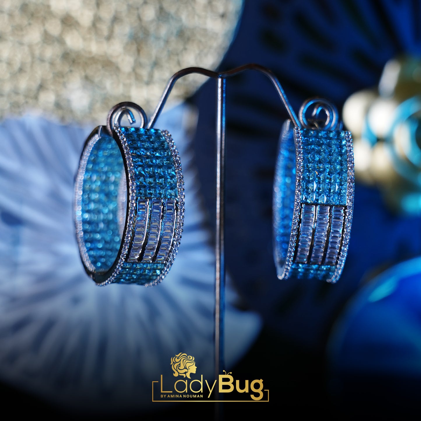 Big Zircon hoops in ice blue color