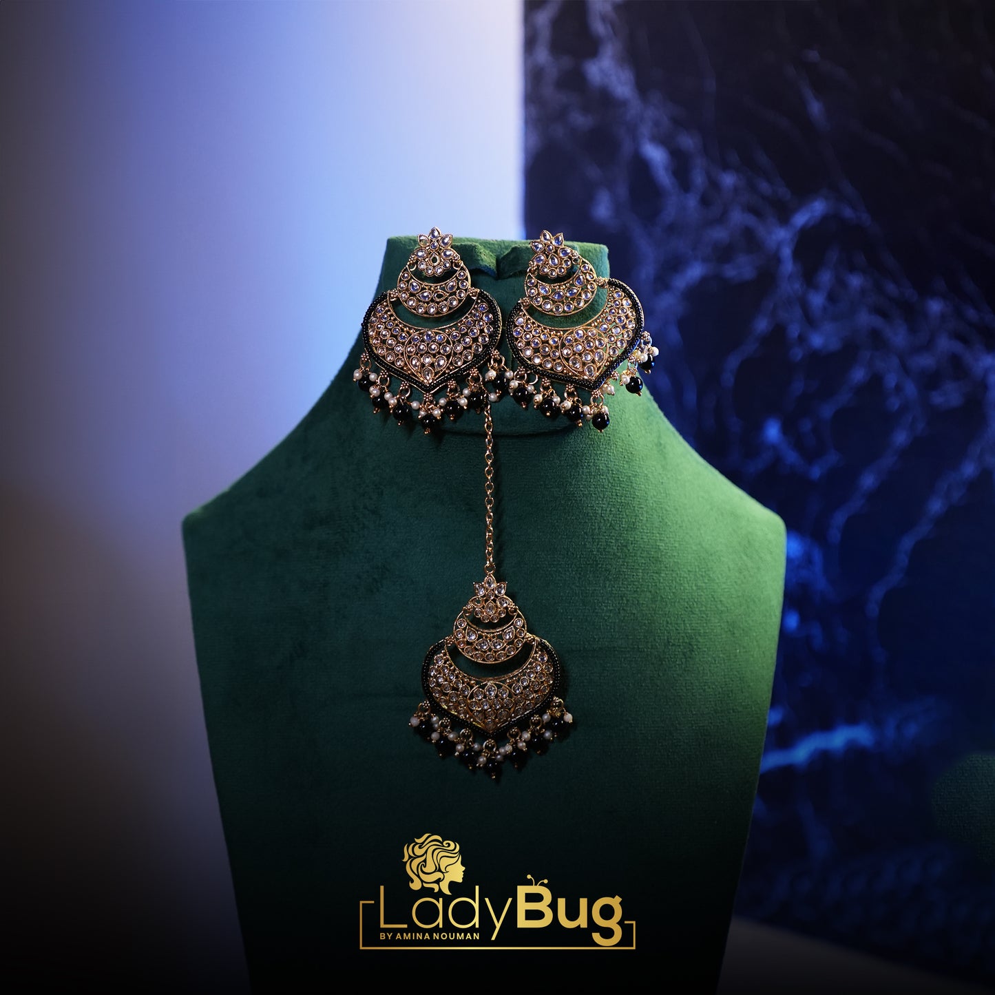 Big Kundan earrings with teeka in black color