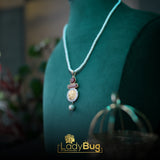Calligraphy pendent with Ruby Stone