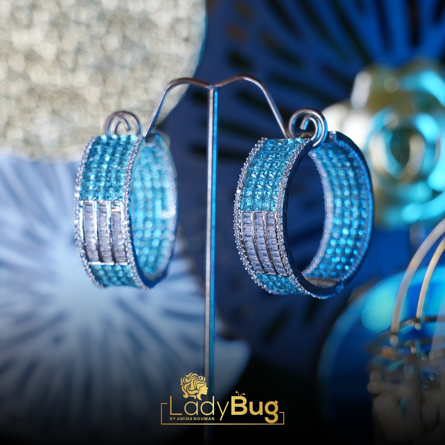 Big Zircon hoops in ice blue color