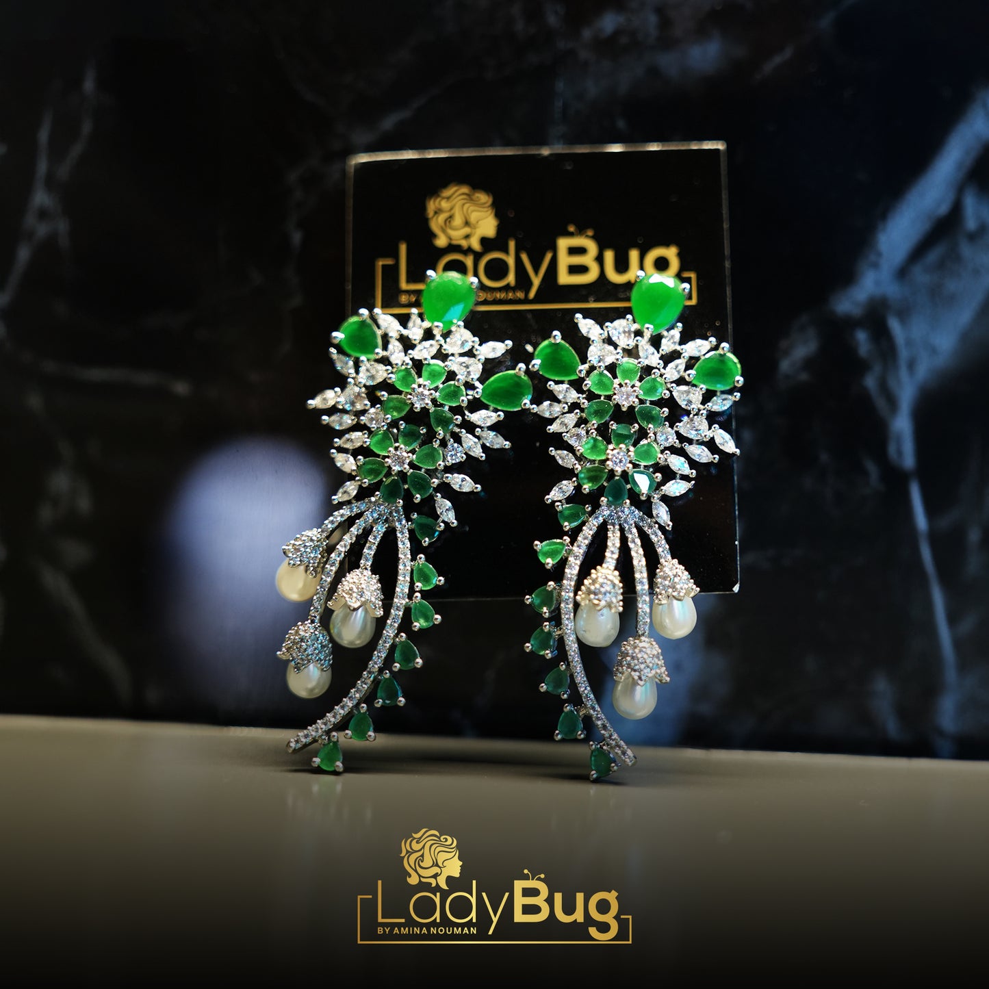 rhodium-plated, Zircon earrings in emerald color with pearls