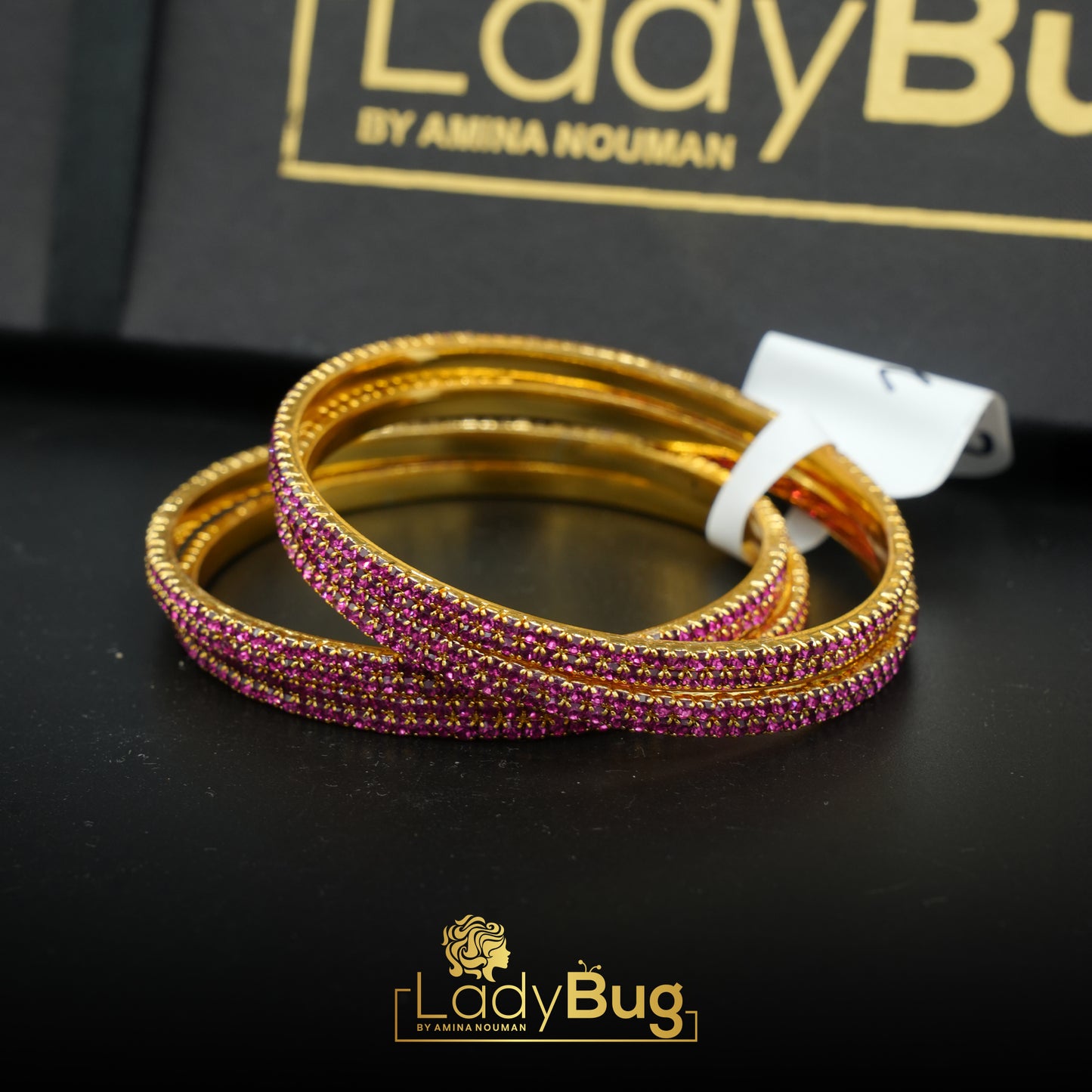 Gold-plated Zircon bangles in a Hot Pink color
