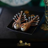 Pearl Zircon Studs in black polish