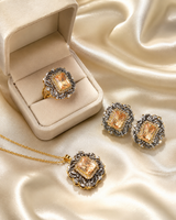 Gold plated diamond cut pendant set with white stones