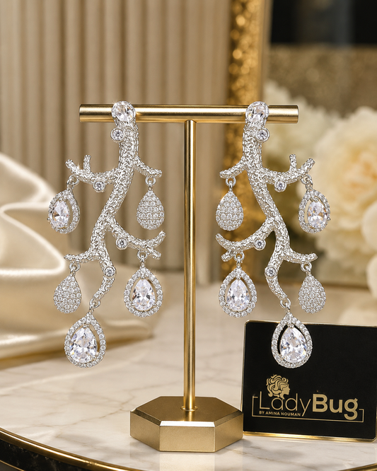 Zircon rhodium-plated drop earrings in rose-gold color