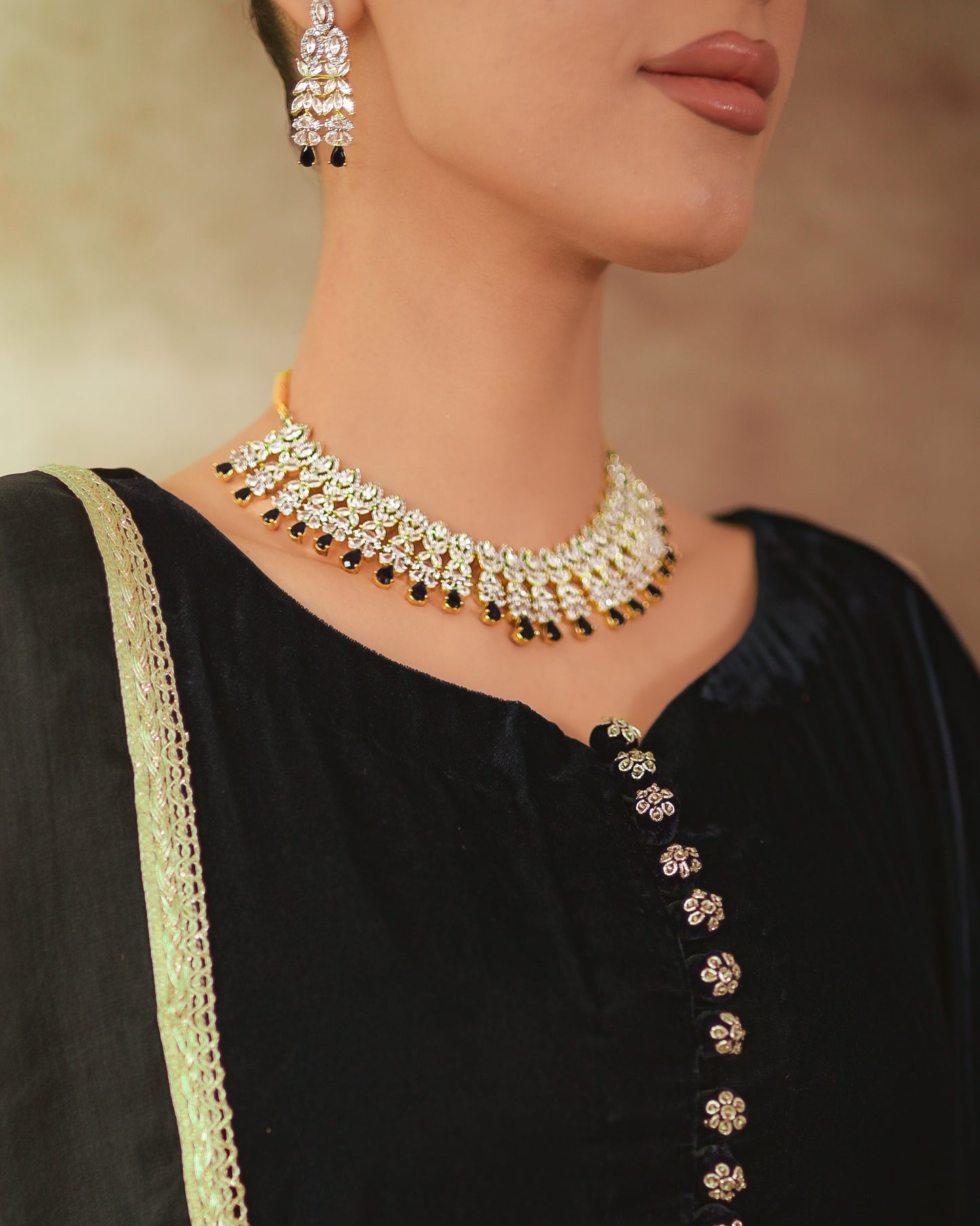 Gold-plated set with Ad Zircon & Sapphire stone