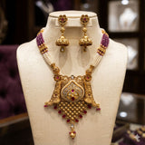 Rajwari set with matte polish and Tiyani Kundan