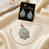 Rhodium plated with zircon pendant set